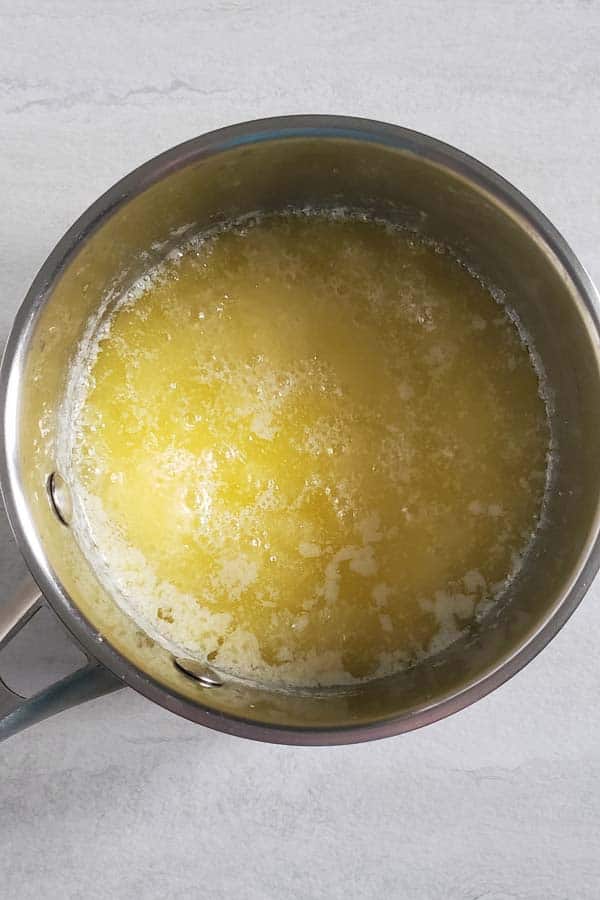 Melted butter in a sauce pan.