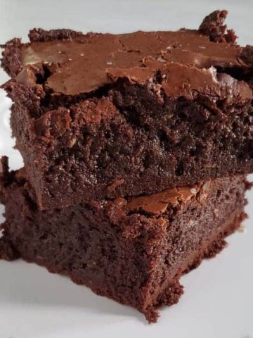close up of two brownies stacked