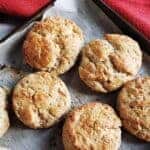Close up of sourdough scones on a baking tray.