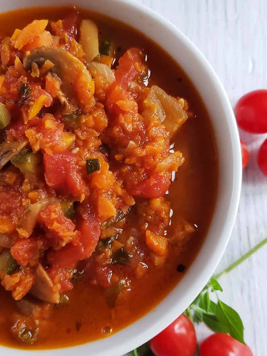 Pasta sauce in a white bowl.