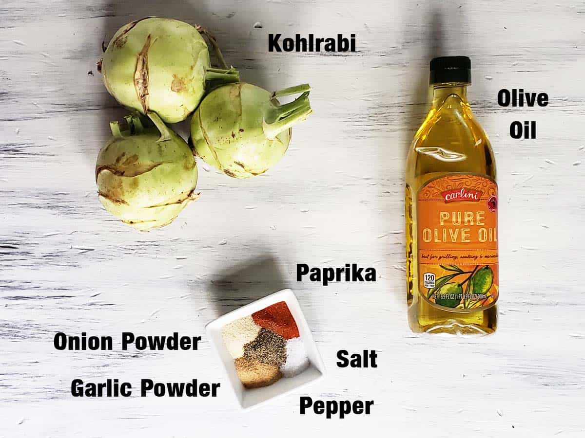 Kohlrabi fries ingredients on a white wood background