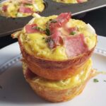 stack of two egg muffins on a white plate