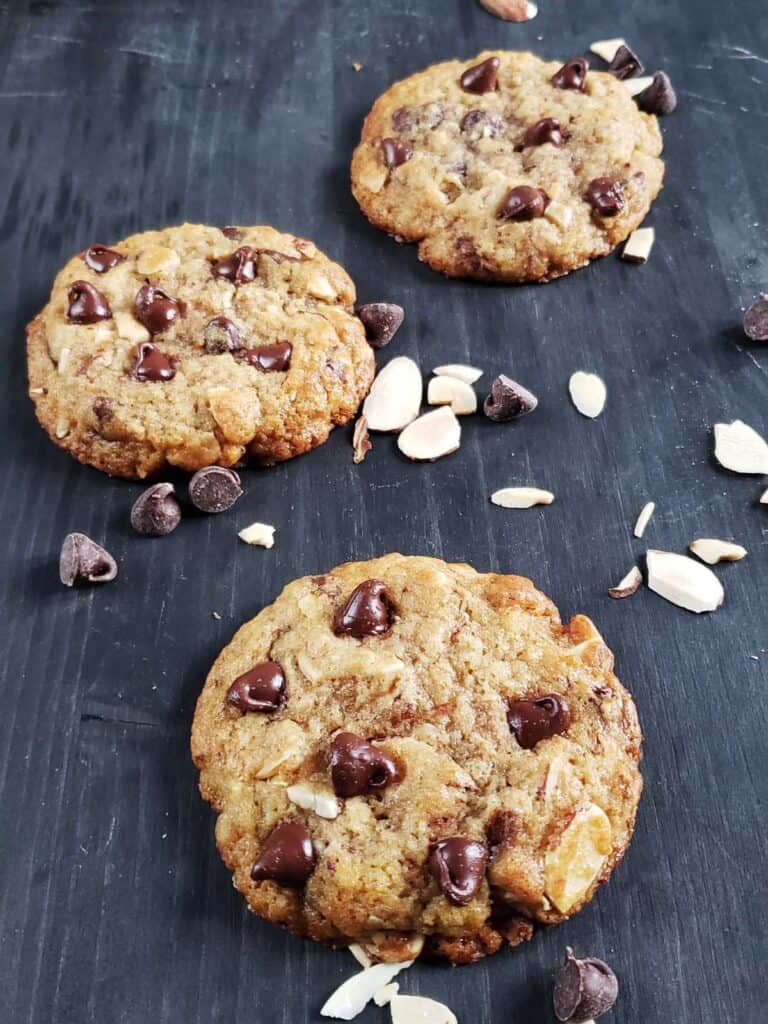 three cookies on a dark background