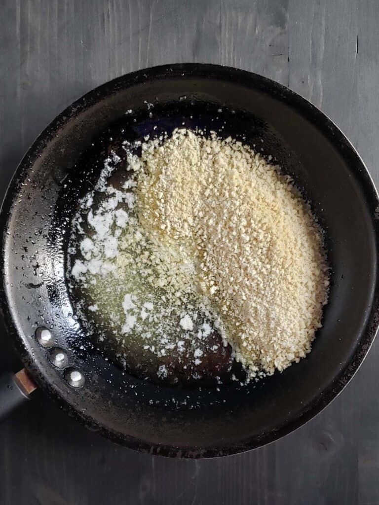 bread crumbs and melted butter in a sauce pan