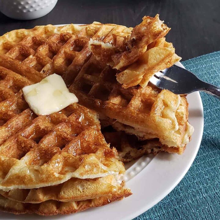 stack of waffles on a white plate