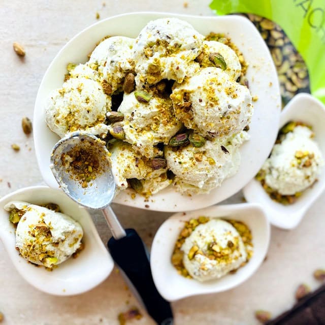 pistachio cardamon ice cream in white bowls