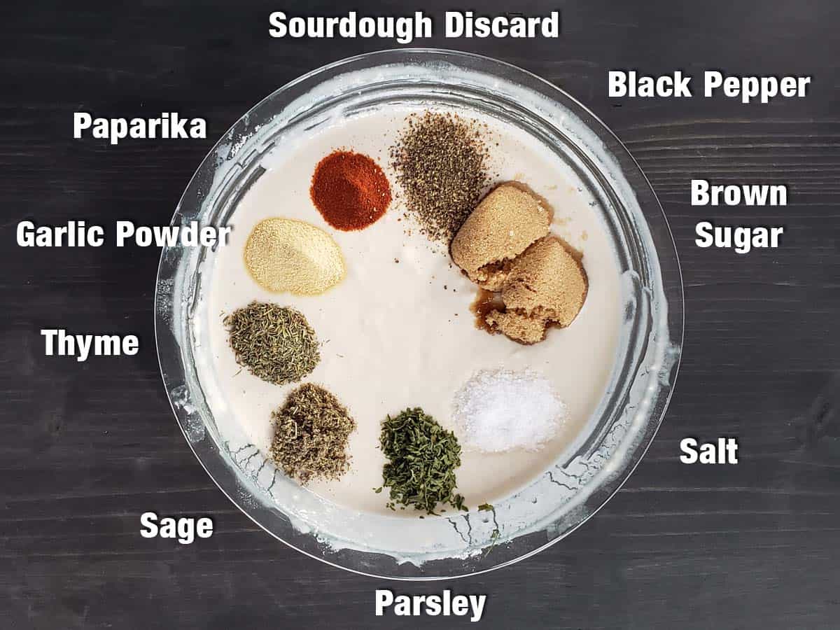 Sourdough batter ingredients in a glass pie plate.
