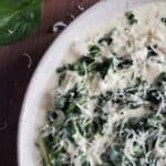 Asiago creamed spinach in a light colored bowl.