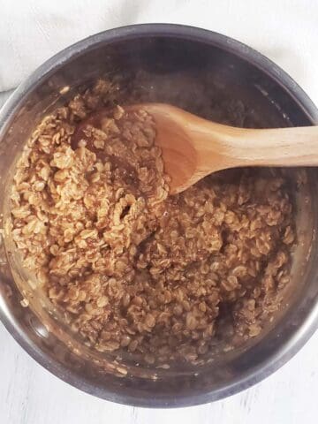 Cooked oatmeal in a sauce pan.