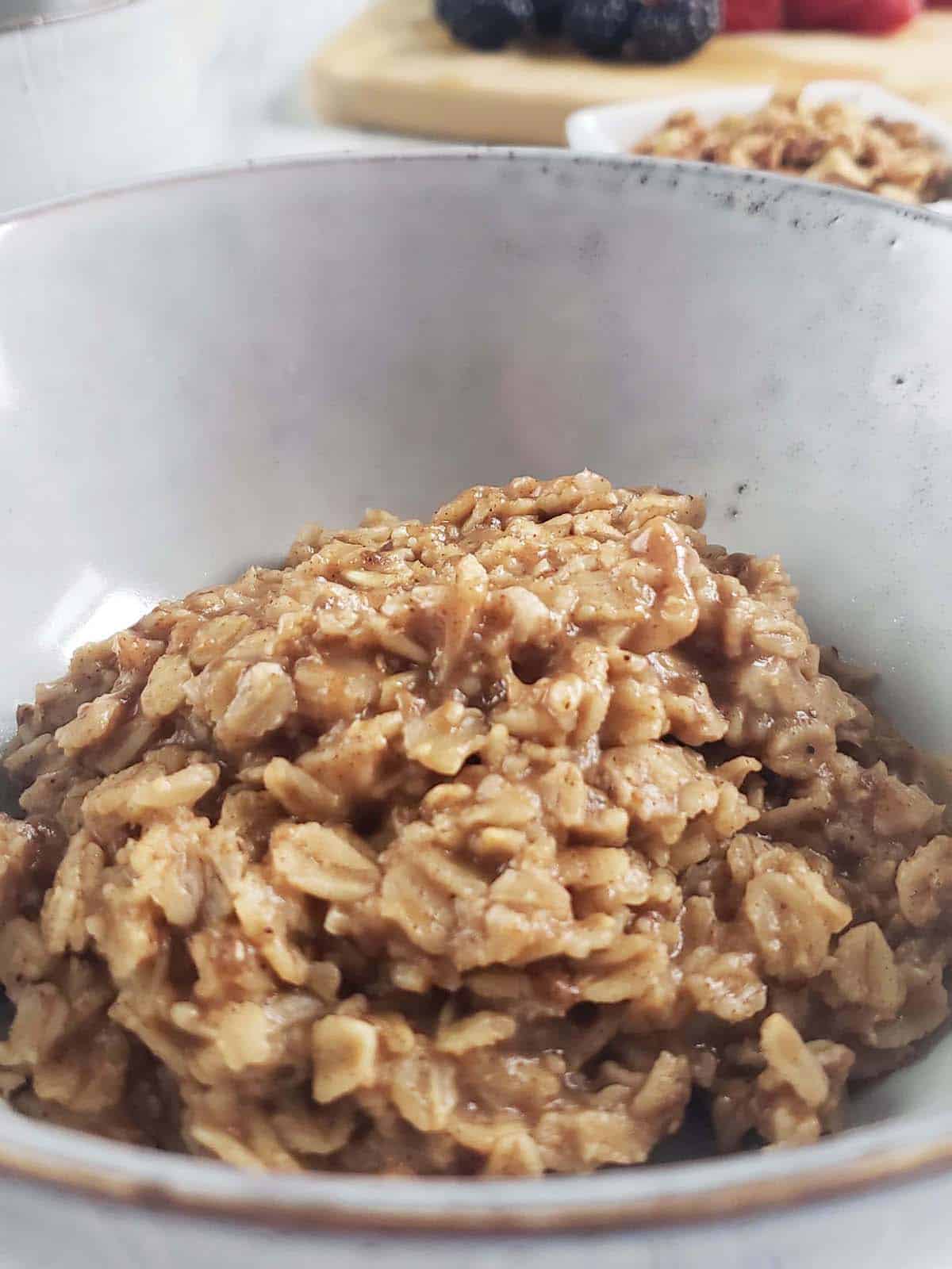 Cooked oatmeal in a bowl.