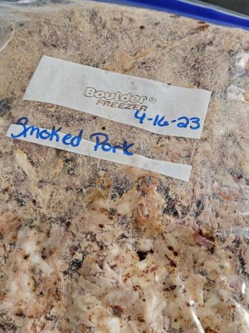 Shredded pork in a ziplock bag.