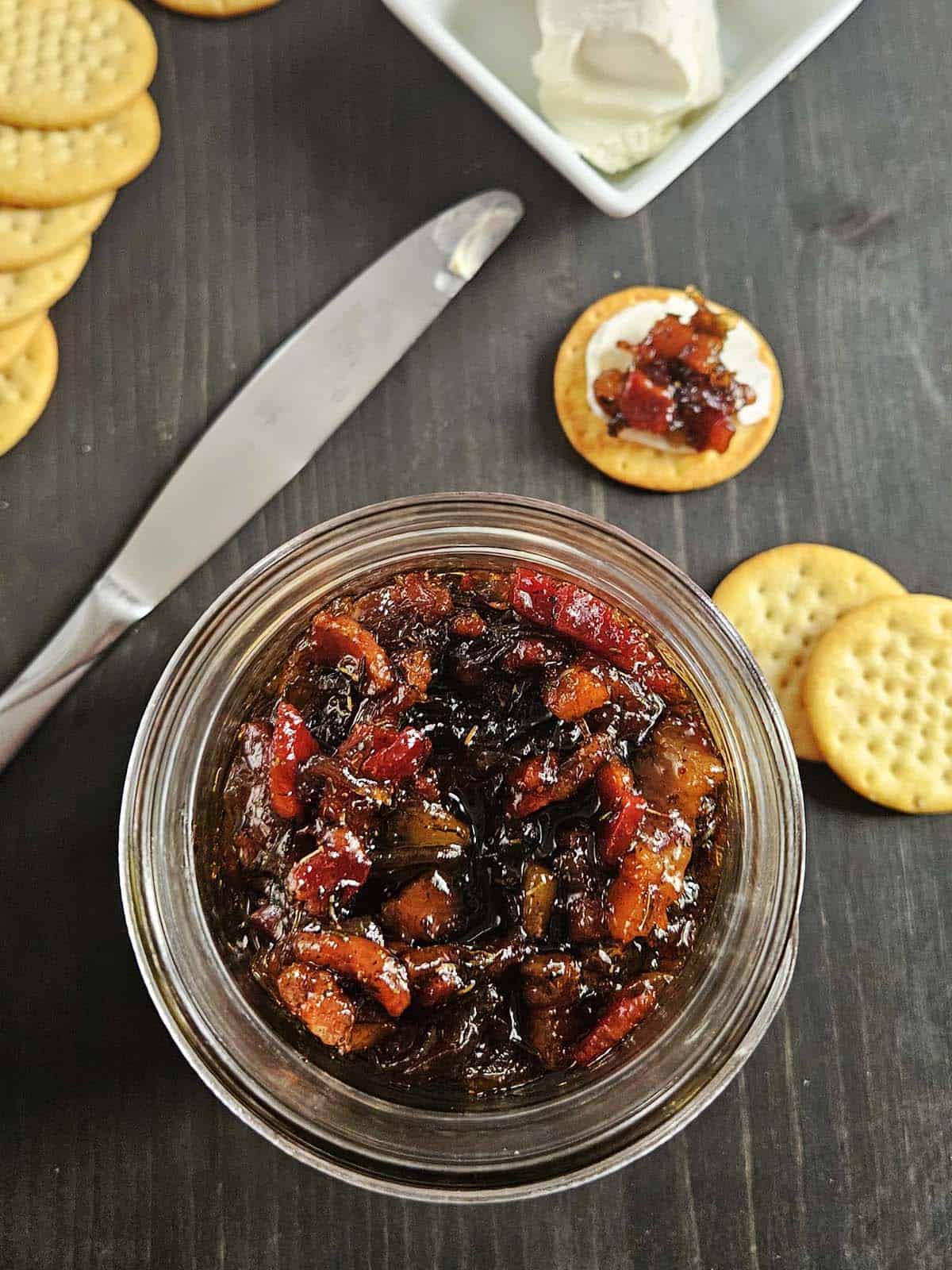 Maple Bacon Onion Jam in a glass jar.