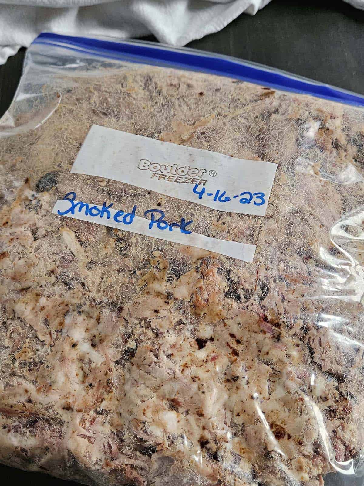 Shredded pork in a ziplock bag.